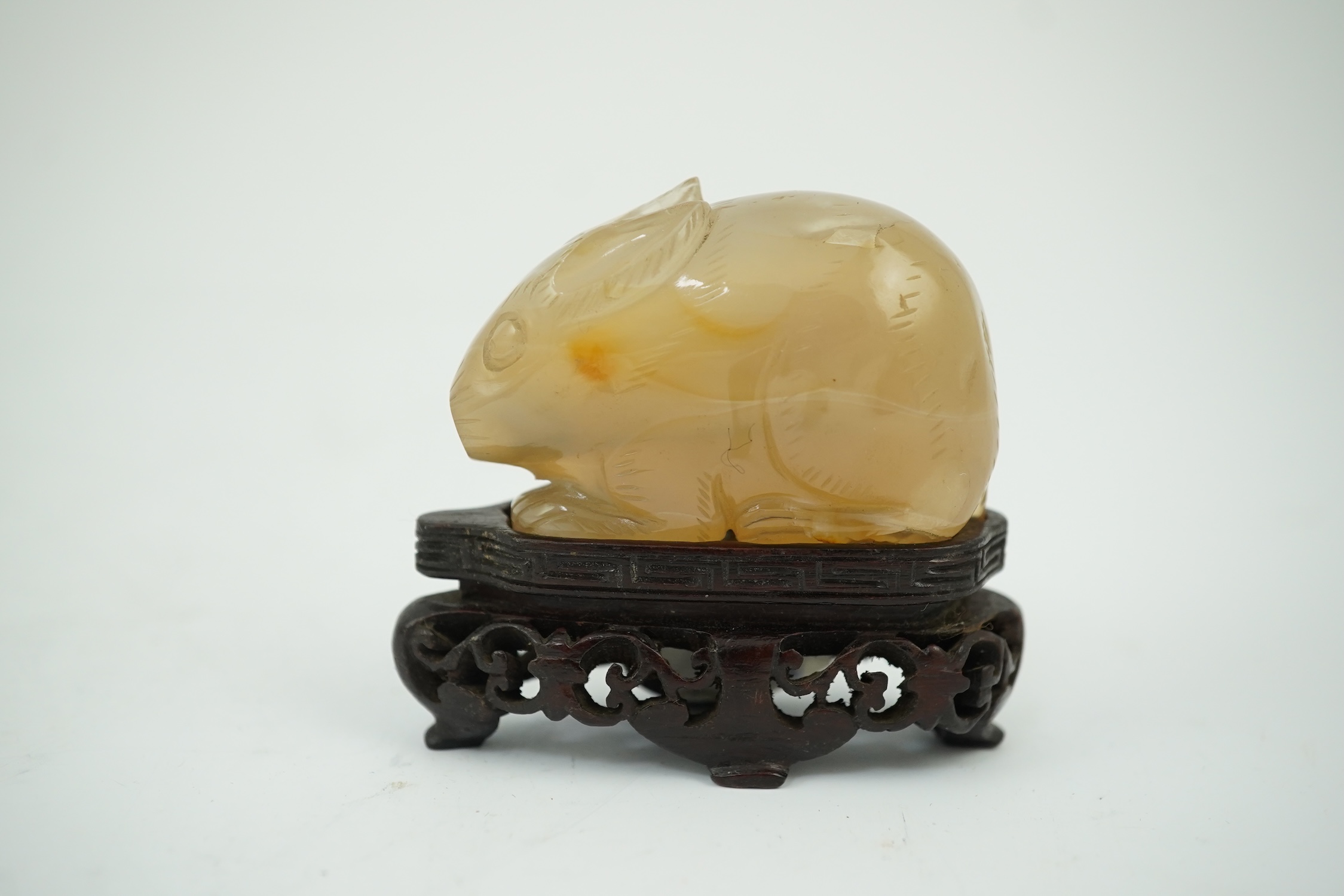 Chinese agate rabbit snuff bottle on stand and green hardstone bug pendant, rabbit snuff bottle 5cm long. Condition - good